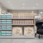 Rayon puériculture avec couches Bambo, biberons Nuk, tapis d éveil, poussette et lit parapluie