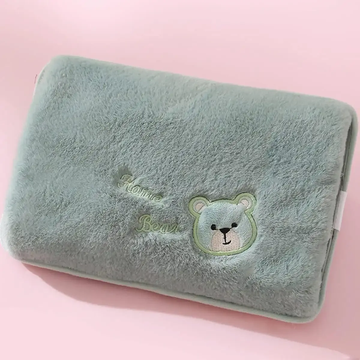 Bouillotte électrique en tissu doux avec poche Bouillotte électrique en tissu doux avec poche